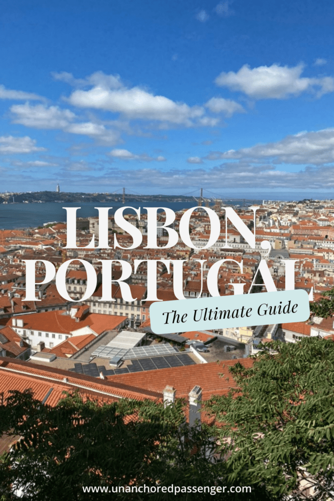 View of Lisbon from Castelo de São Jorge with text that says "Lisbon, Portugal the Ultimate Guide"