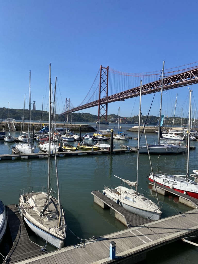 View of the 25 de Abril Bridge from Doca de Santo Amaro in Lisbon. Portugal