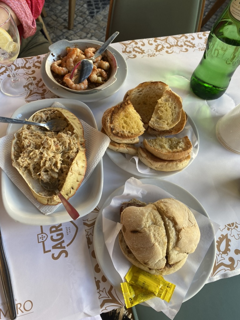 Garlic shrimp, crab, and prego (steak sandwich) at the famous Ramiro restaurant in Lisbon, Portugal