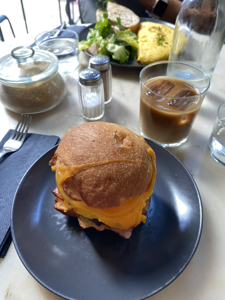 Breakfast sandwich and ice coffee at Dear Breakfast in Lisbon, Portugal