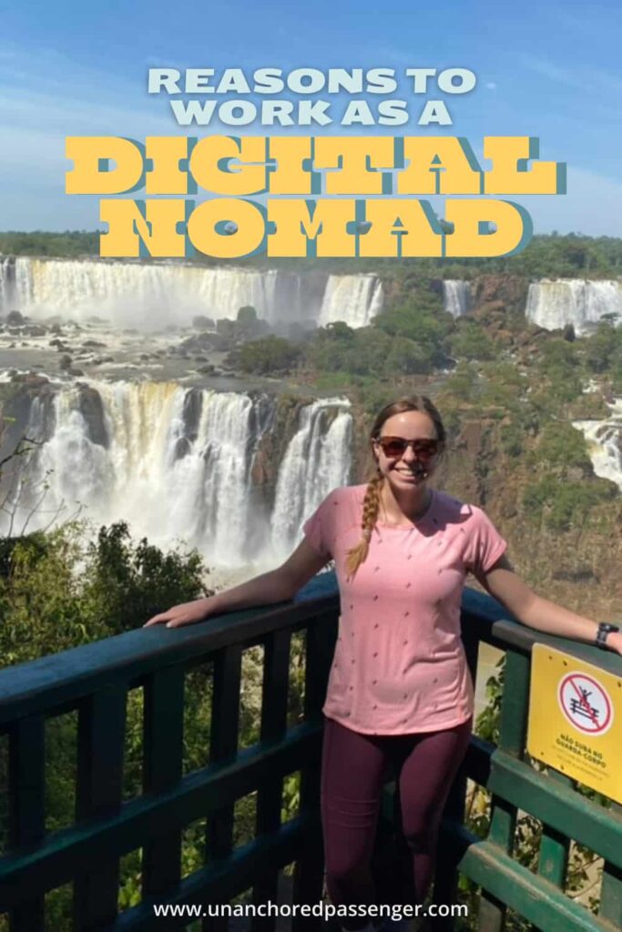 Woman smiling at lookout point with Iguazu Falls in the background with text that reads, "Reasons to Work as a Digital Nomad"