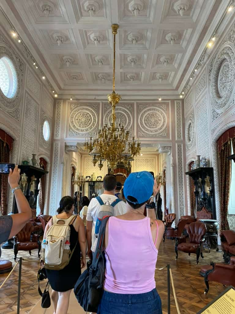 Crowds inside a room at Pena Palace in Sintra, Portugal