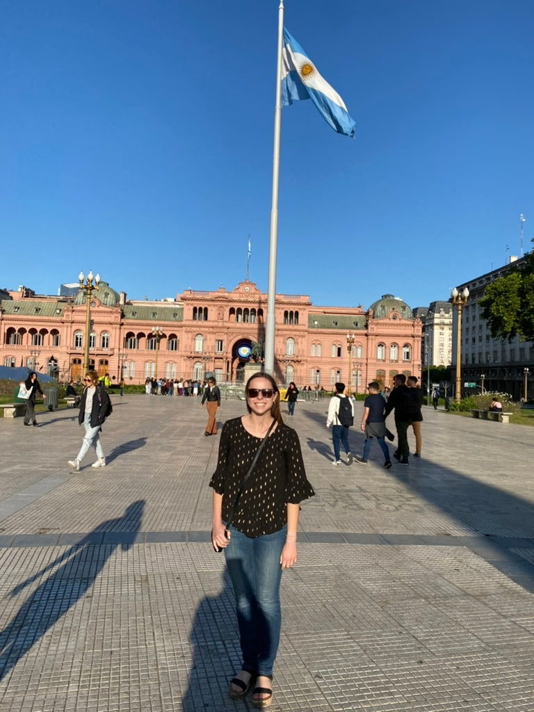 Woman smiling in the Plaza de Mayo in Buenos Aires