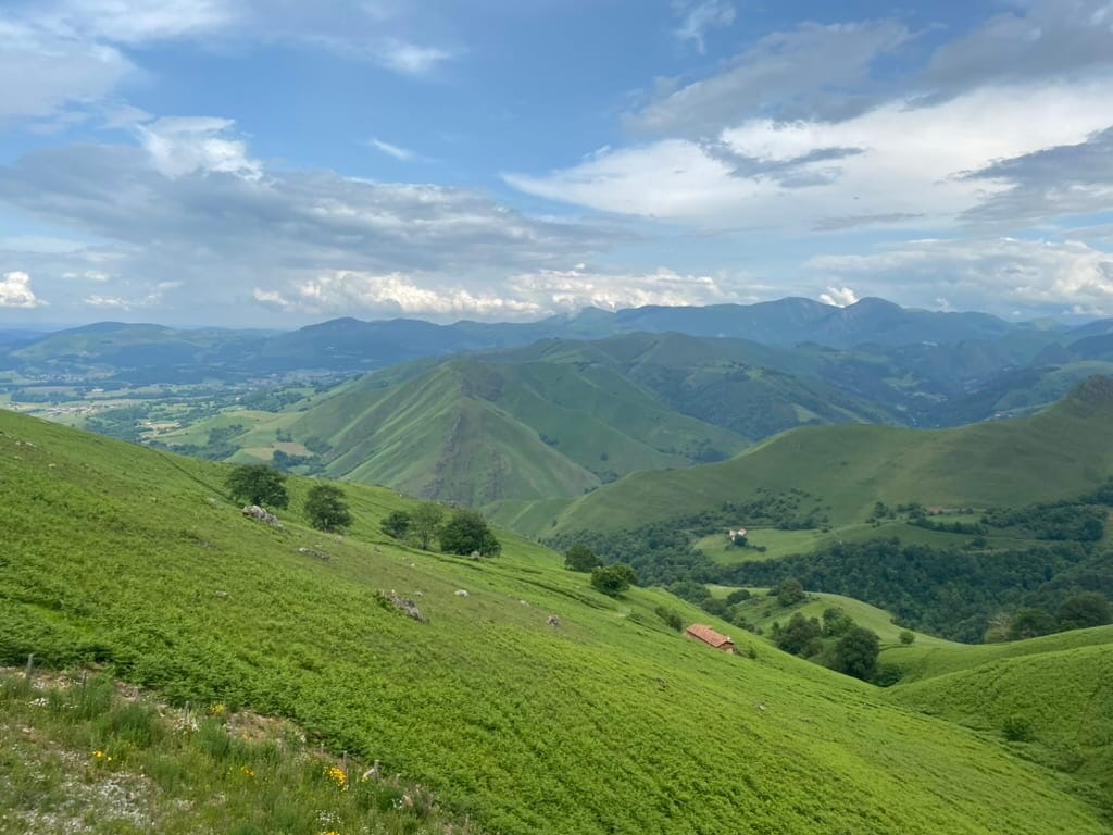 Lush green mountains from a viewpoint at Refuge Orisson, France along the Camino Francés.