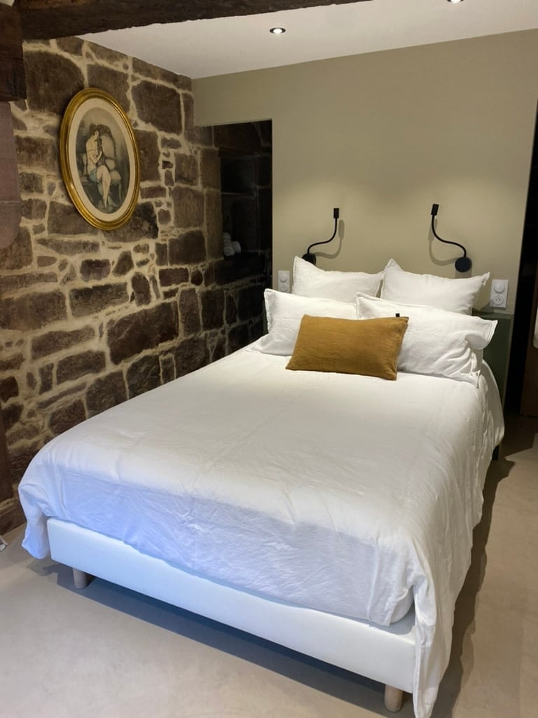 Bed in a hotel room in Saint-Jean-Pied-de-Port.