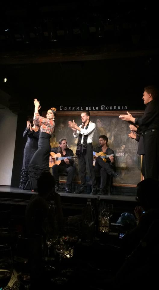 Flamenco dancers clapping during a show in Madrid, Spain.