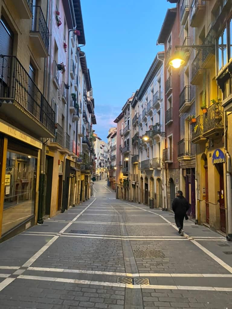 Narrow streets of Pamplona, Spain just before sunrise along the Camino Francés.